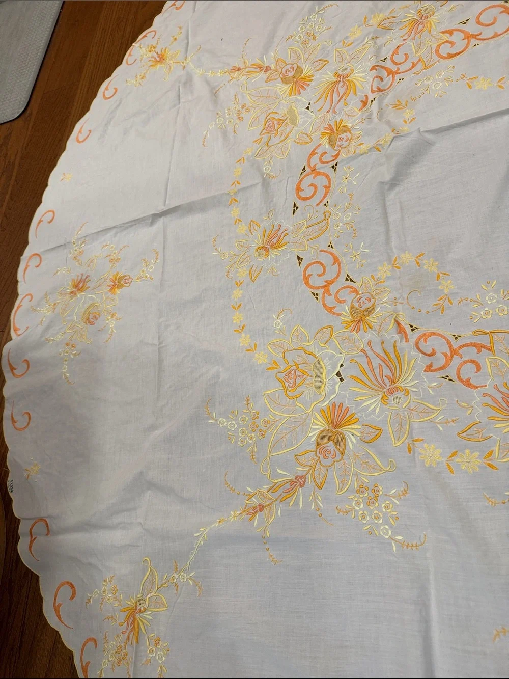 White vintage Tablecloth W/ Orange & Yellow Floral  Design. Size 114x64